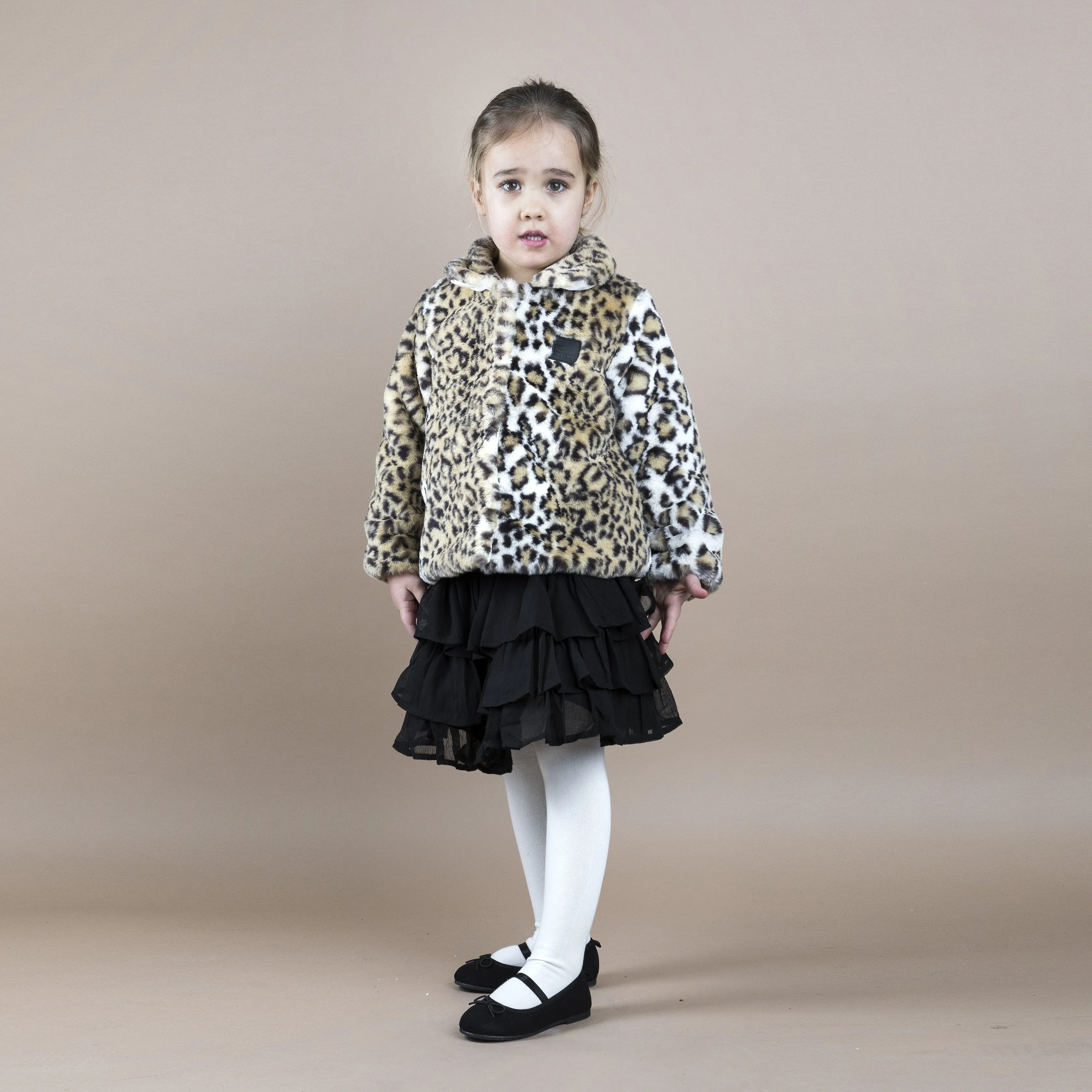 The Tiny Fur Coat
