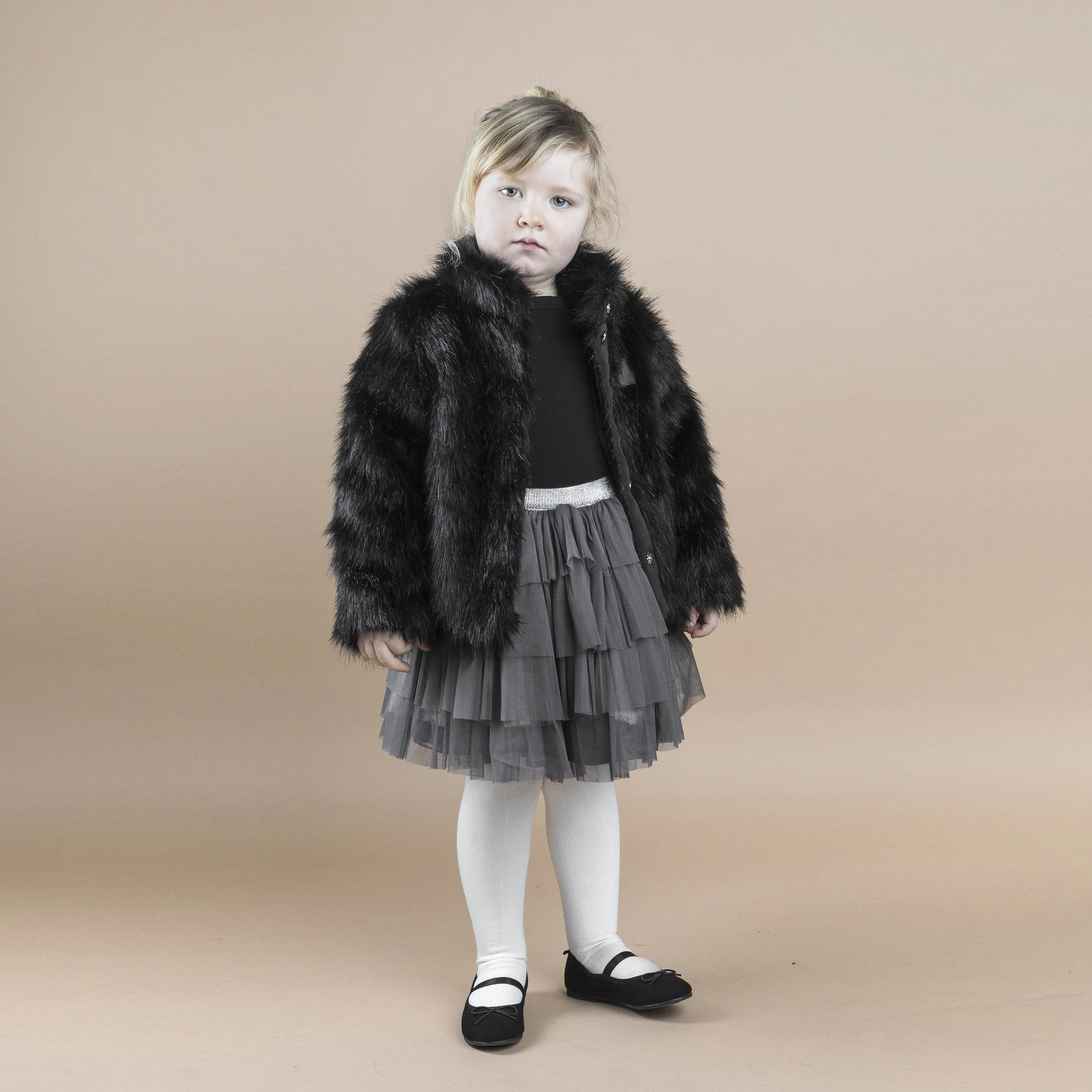 The Tiny Fur Coat